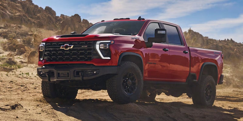 Red 2025 Chevy Silverado in desert
