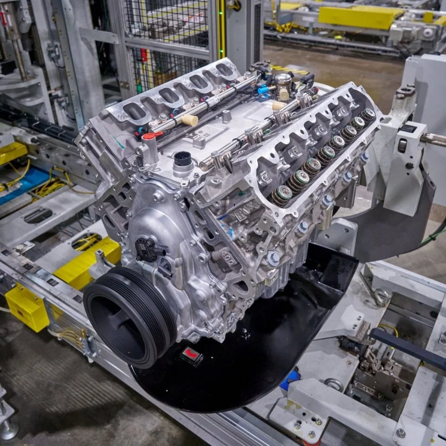 All-new sixth-generation 6.6L V8 engine during assembly at GM's Flint Engine Operations, with the 400 cubic inch casting mark visible on the block