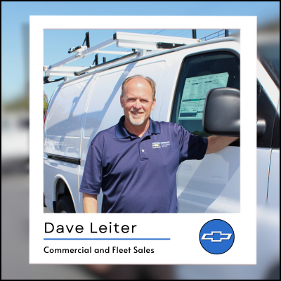 Picture of commercial and fleet sales beside a work van.