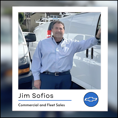 Picture of commercial and fleet sales beside a work van.